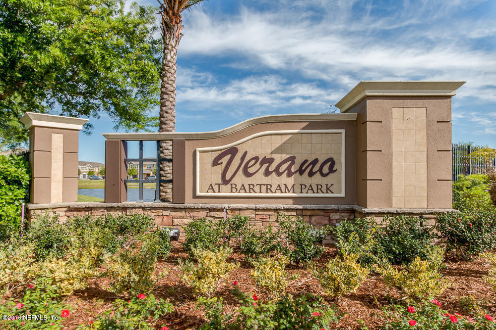 12935 Spring Rain Road Jacksonville, FL 32258 - Photo 1 of 28 a sign on the side of a building