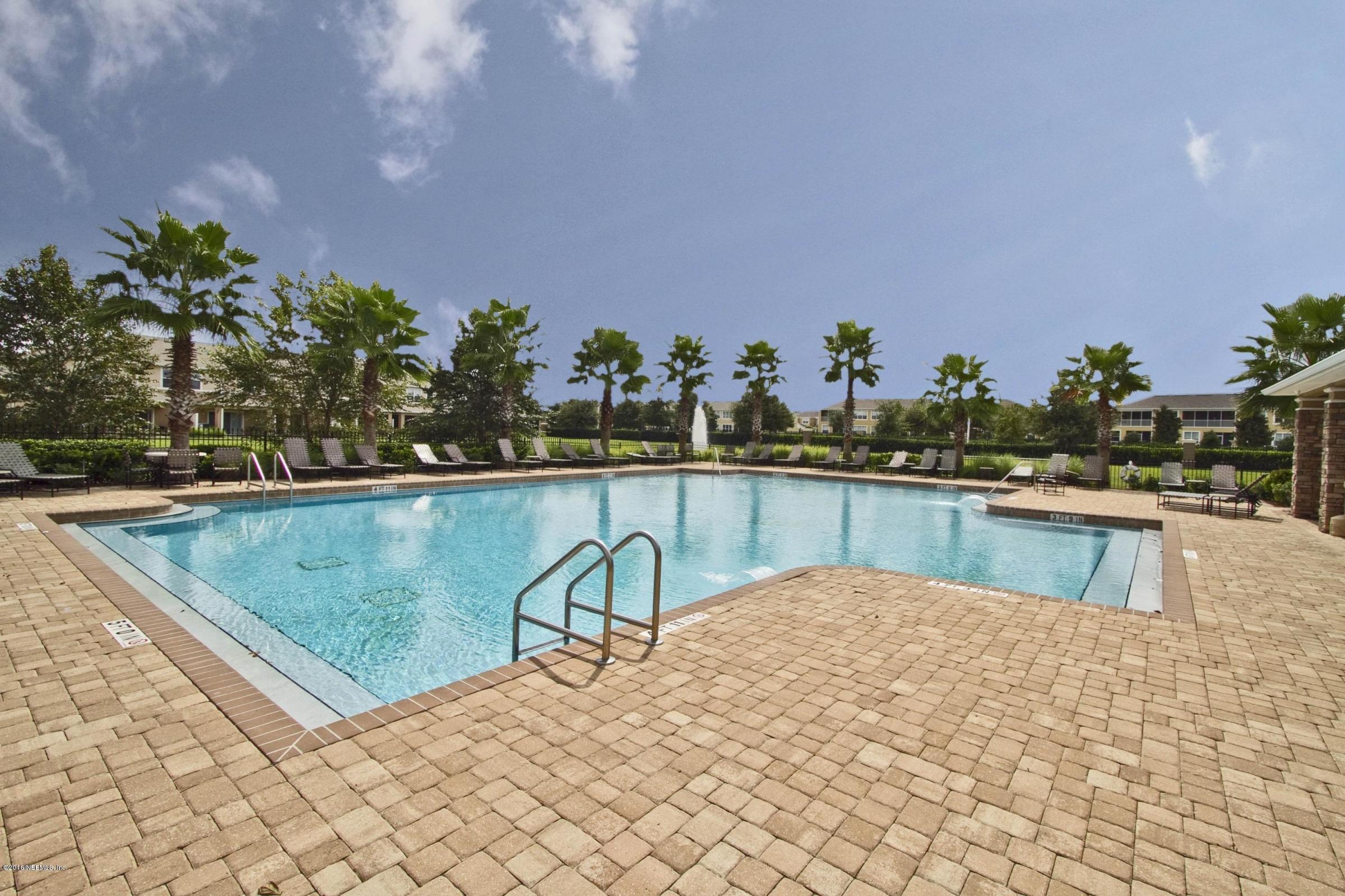 12935 Spring Rain Road Jacksonville, FL 32258 - Photo 27 of 28 a view of swimming pool with outdoor seating