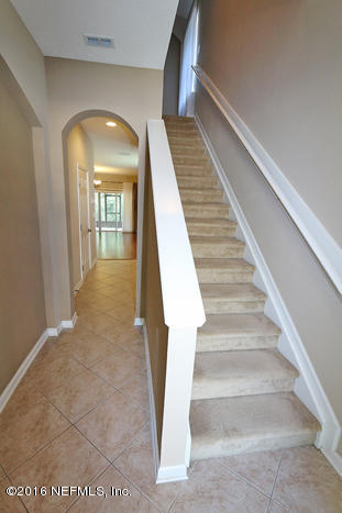 12935 Spring Rain Road Jacksonville, FL 32258 - Photo 10 of 28 a view of entryway and hall with wooden floor