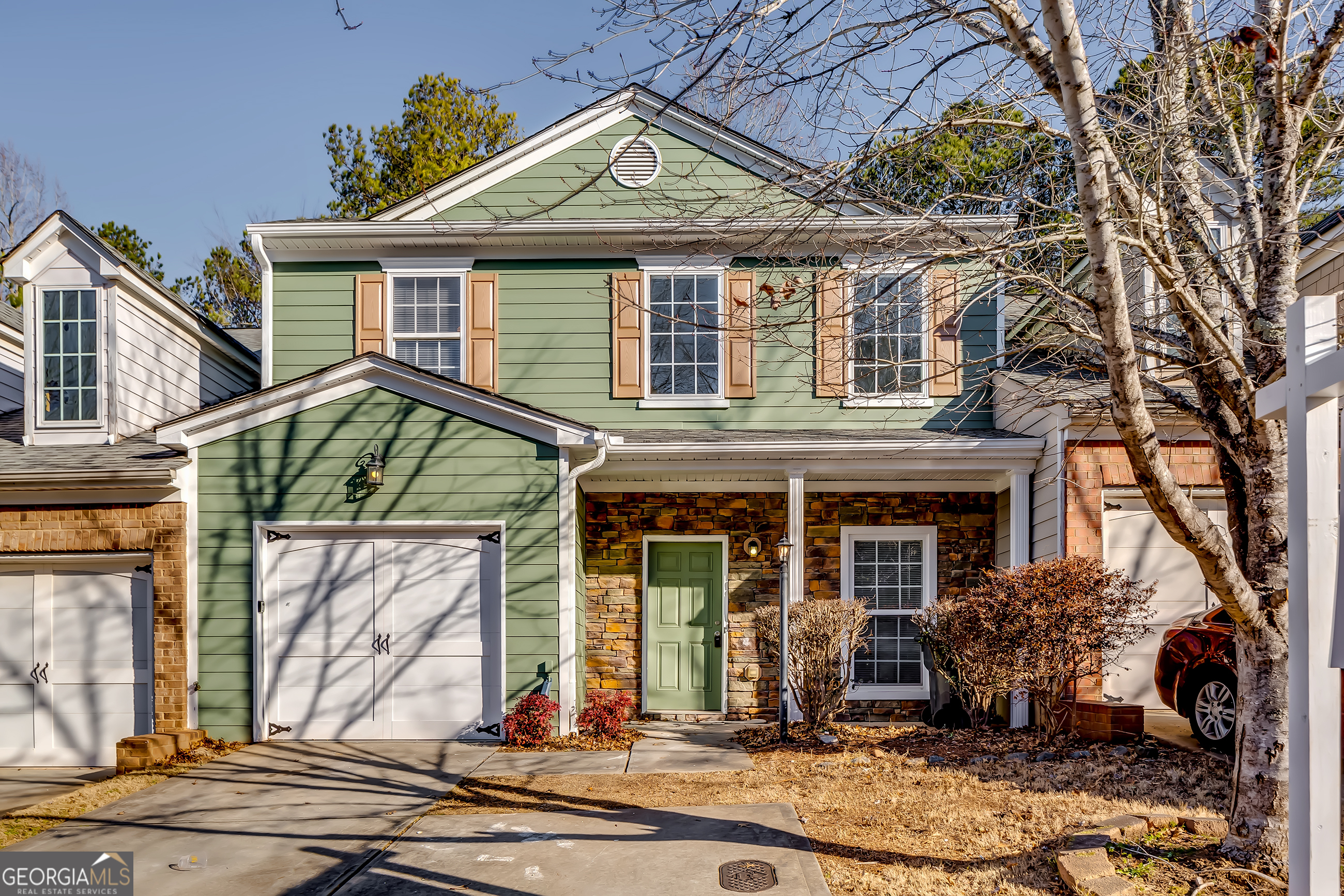 6269 Colonial View Fairburn, GA 30213 - Photo 1 of 13 a front view of a house with garden