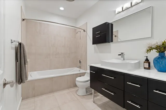 a view of a hallway with washer and dryer