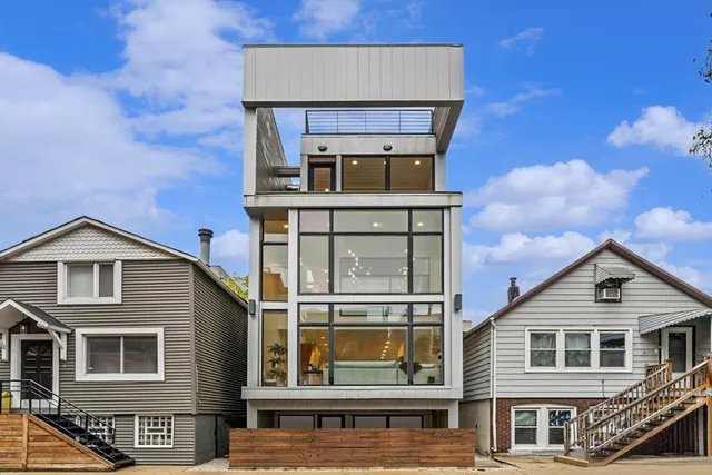 a front view of a house with a balcony