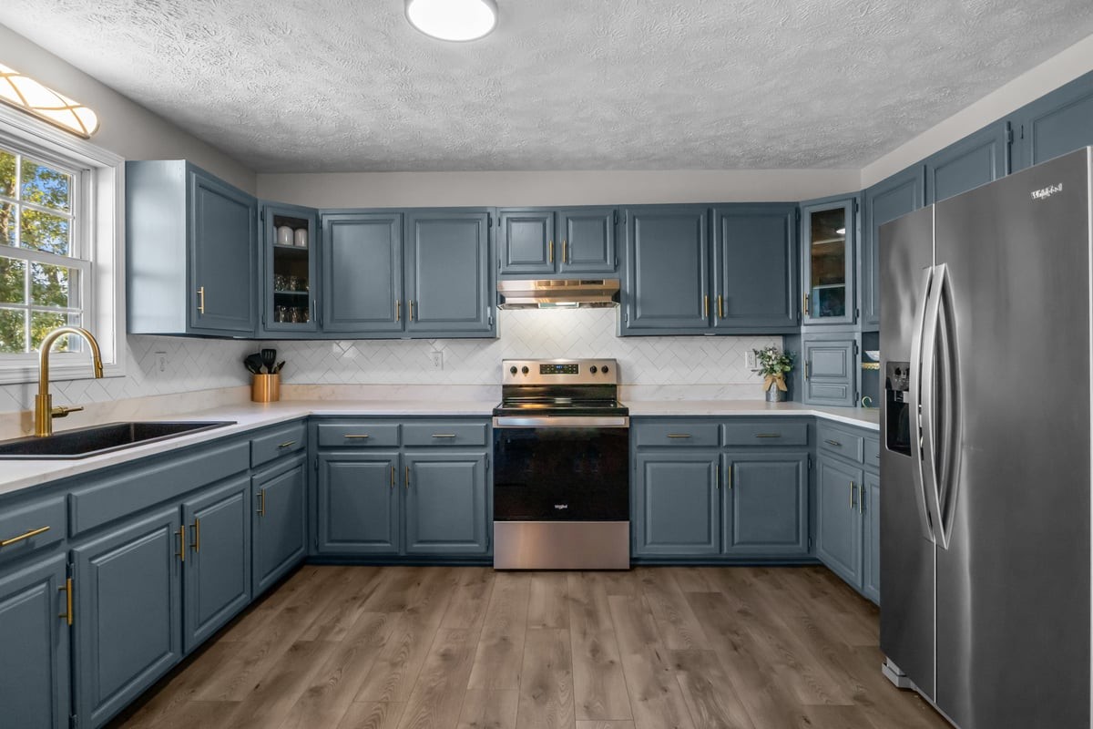 365 Little Benton Road Mansfield, TN 38236 - Photo 17 of 53 a kitchen with a refrigerator stove top oven and sink