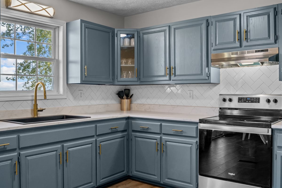 365 Little Benton Road Mansfield, TN 38236 - Photo 19 of 53 a kitchen with appliances cabinets and a sink