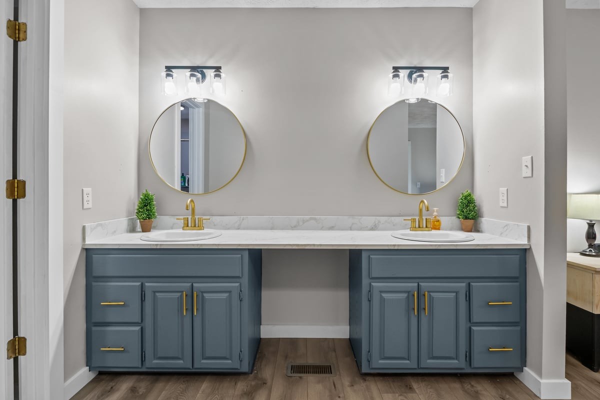 365 Little Benton Road Mansfield, TN 38236 - Photo 23 of 53 a bathroom with a double vanity sink and a mirror