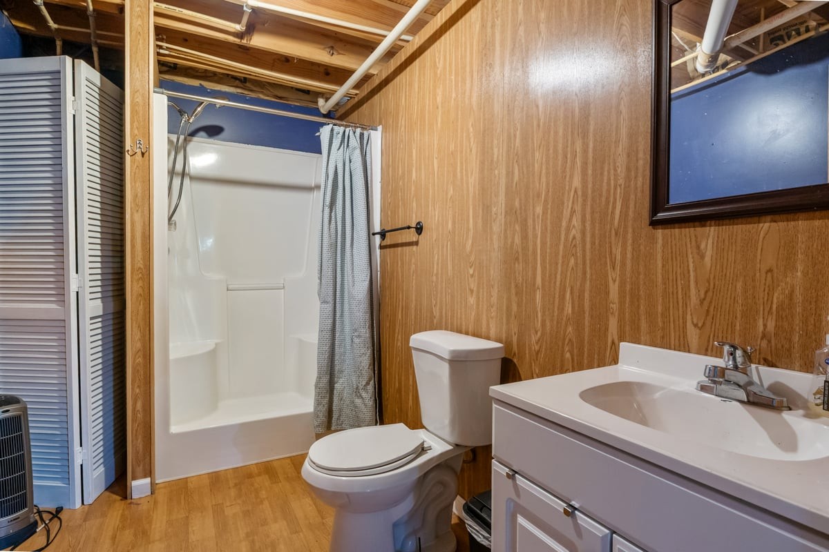 365 Little Benton Road Mansfield, TN 38236 - Photo 32 of 53 a bathroom with a sink and a mirror