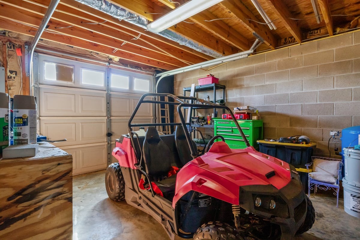 365 Little Benton Road Mansfield, TN 38236 - Photo 34 of 53 a bedroom with bed and a baby crib