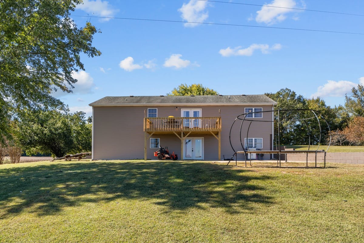365 Little Benton Road Mansfield, TN 38236 - Photo 37 of 53 a view of a house with a big yard