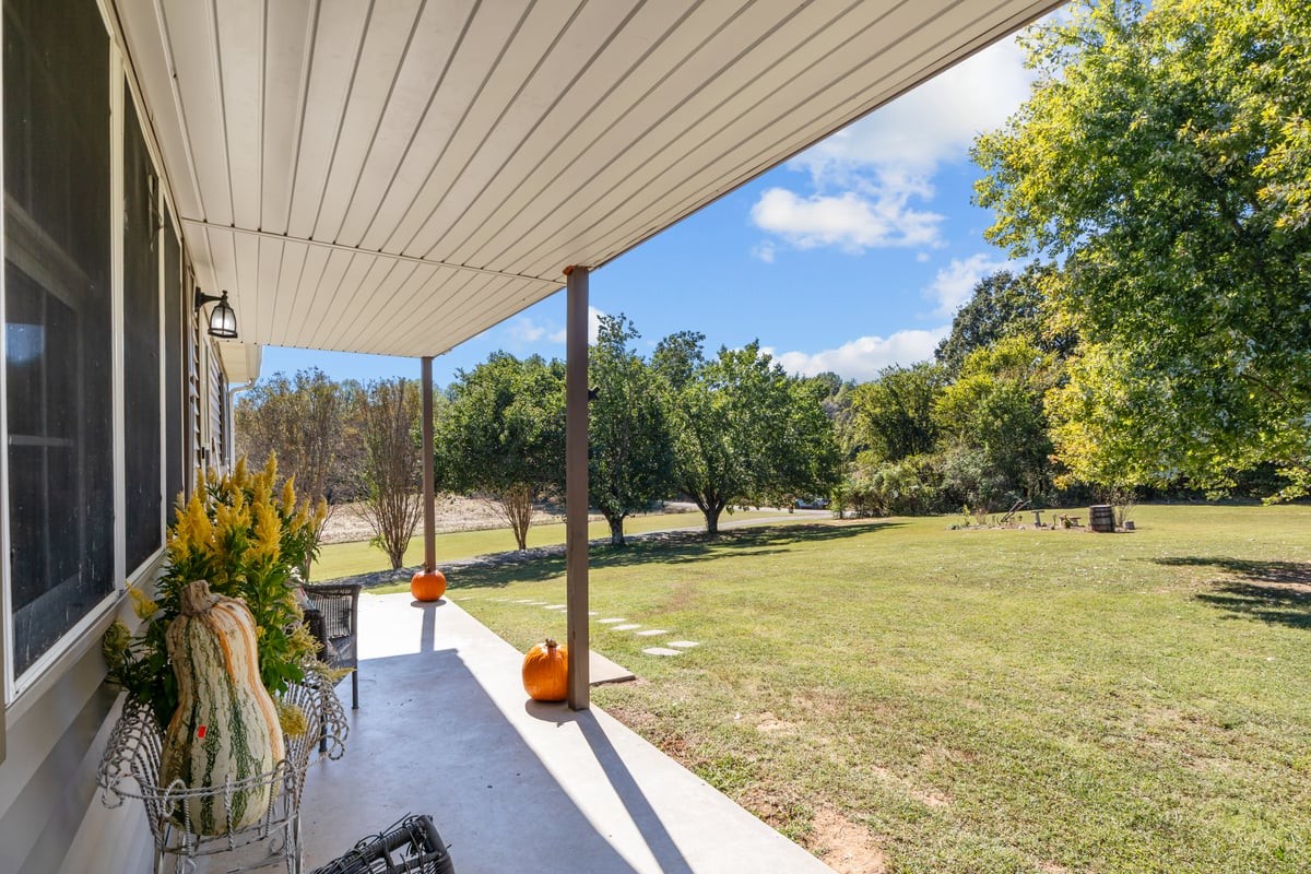 365 Little Benton Road Mansfield, TN 38236 - Photo 4 of 53 a view of a swimming pool with a patio