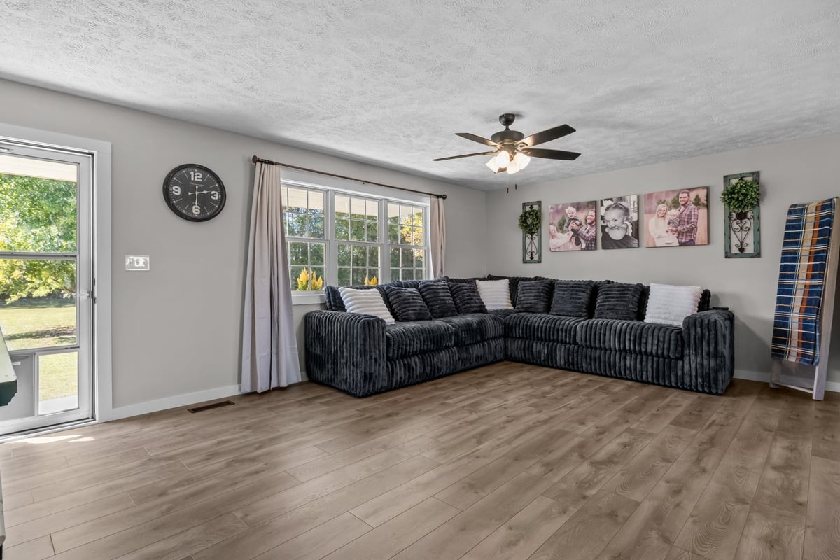 365 Little Benton Road Mansfield, TN 38236 - Photo 5 of 53 a living room with furniture and a large window
