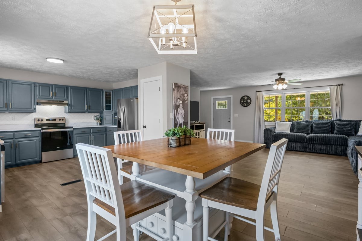 365 Little Benton Road Mansfield, TN 38236 - Photo 8 of 53 a view of a dining room with furniture window and wooden floor