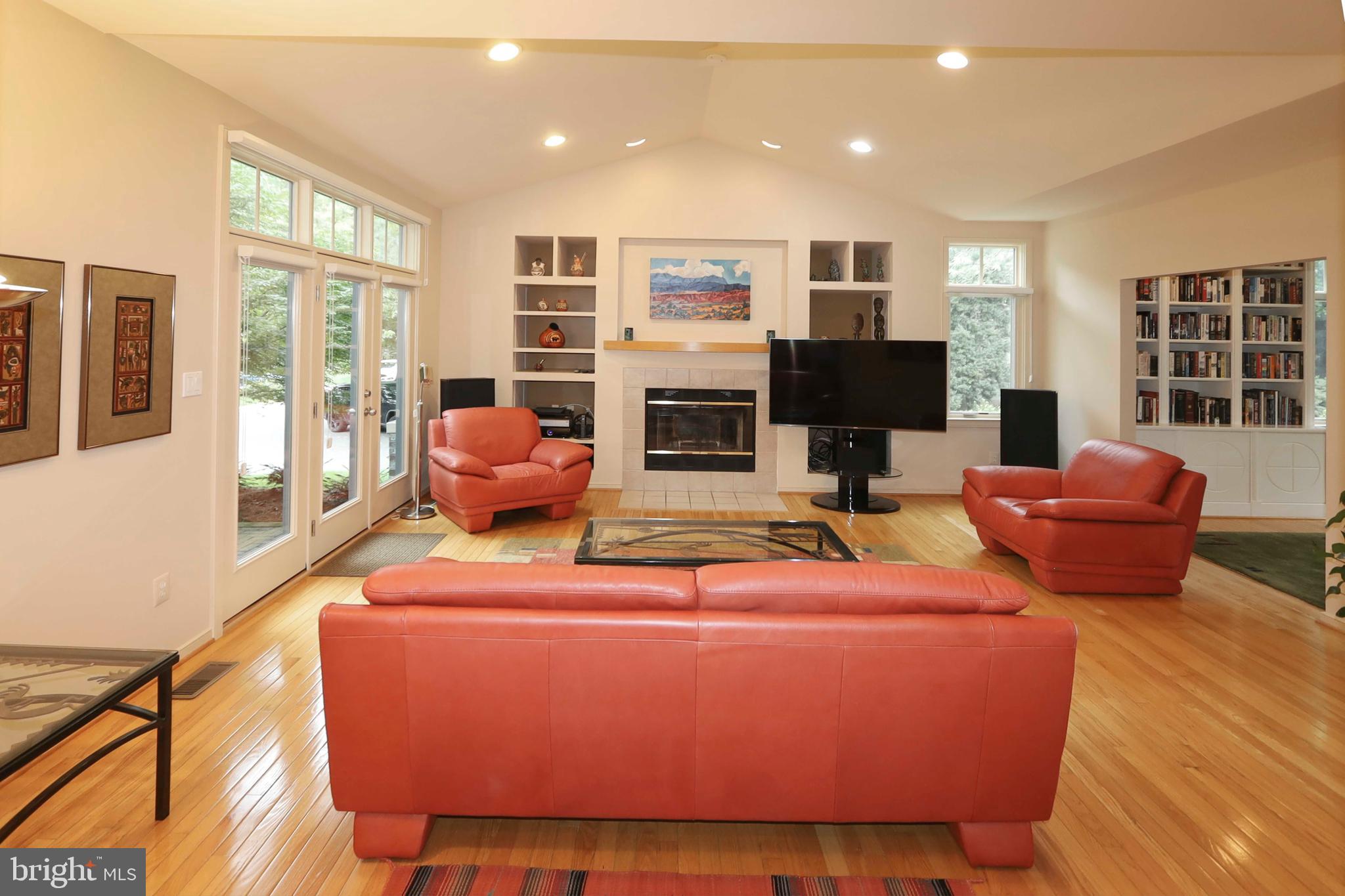 1453 Waterfront Road Reston, VA 20194 - Photo 9 of 56 The fireplace is surrounded by built-in shelving