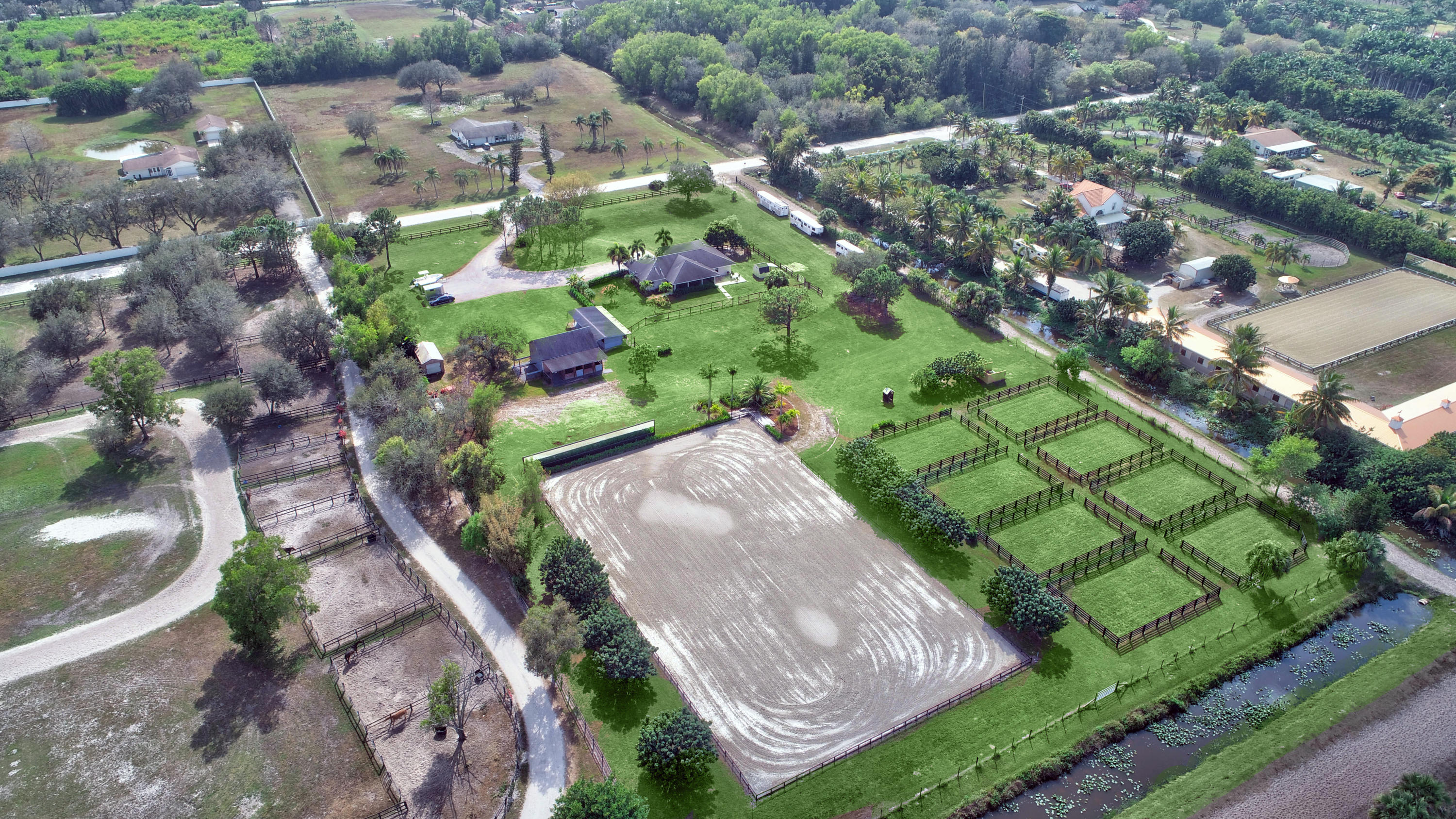 16493 Rustic Road Wellington, FL 33470 - Photo 2 of 57 a view of a garden