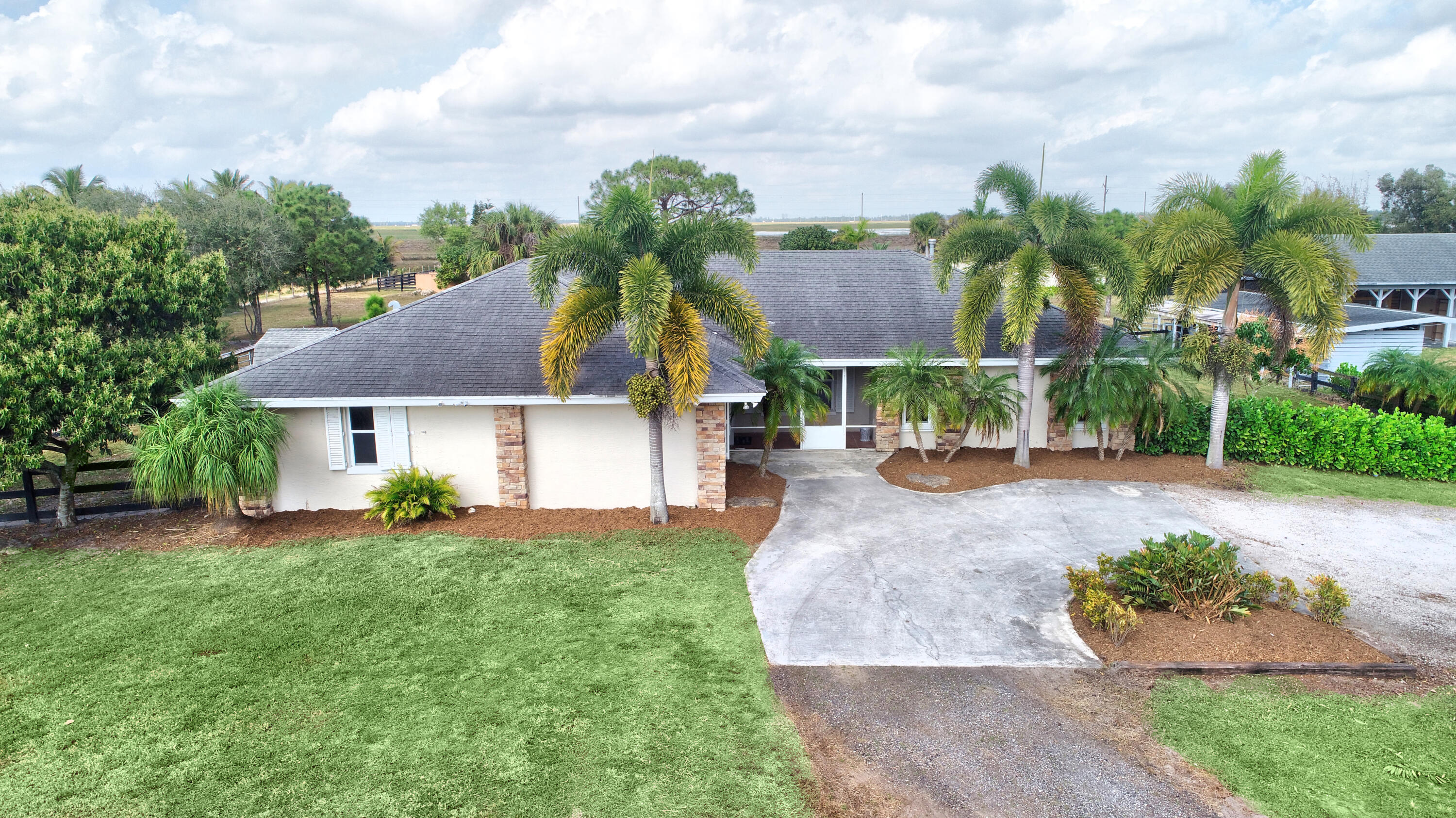 16493 Rustic Road Wellington, FL 33470 - Photo 3 of 57 01_dji_0001_2_3_4_5
