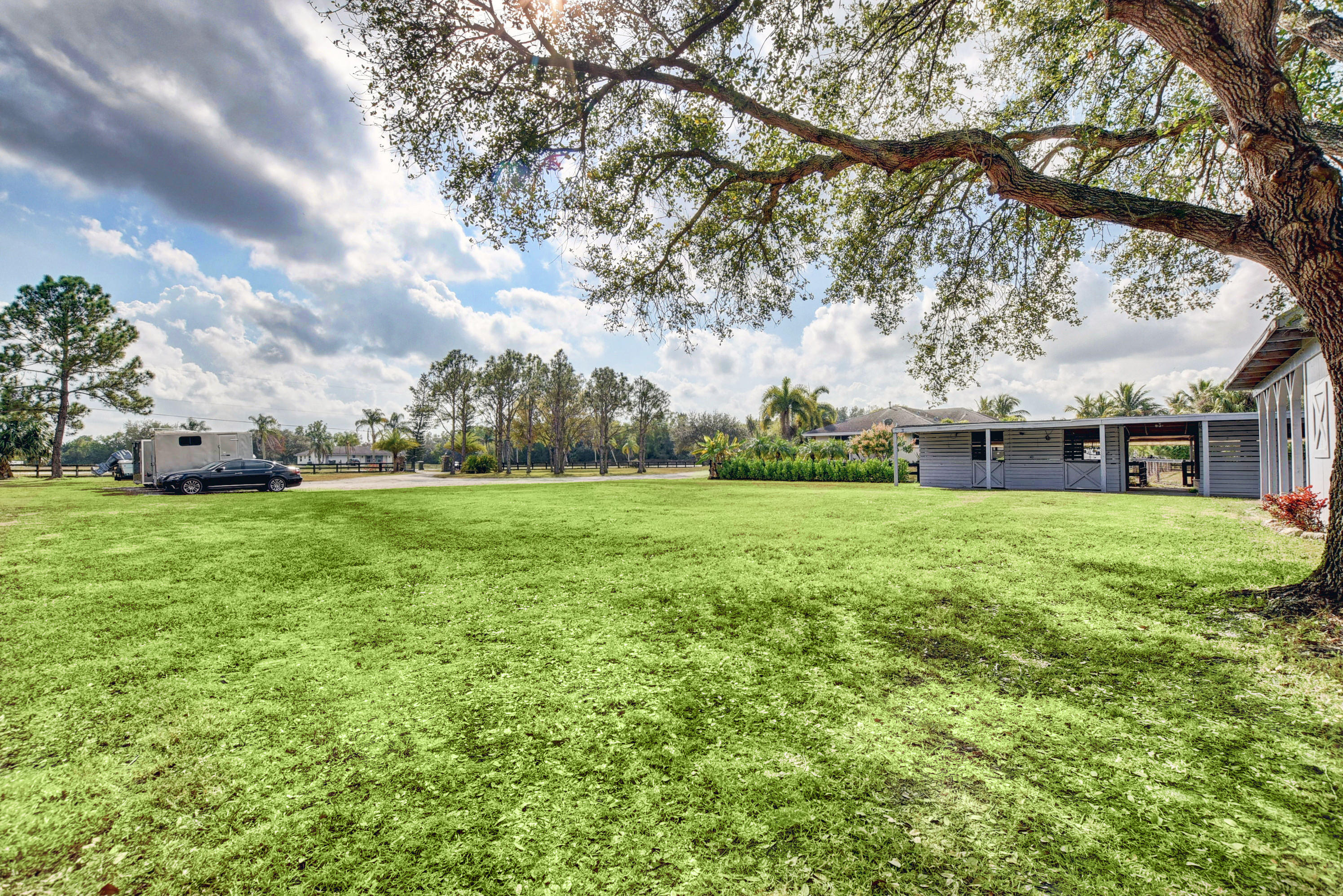 16493 Rustic Road Wellington, FL 33470 - Photo 43 of 57 a view of yard with green space