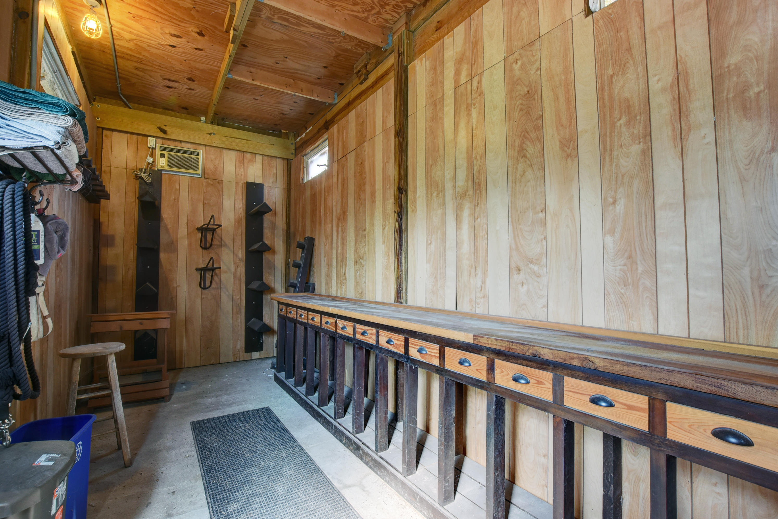 16493 Rustic Road Wellington, FL 33470 - Photo 47 of 57 a view of a porch with wooden floor and furniture