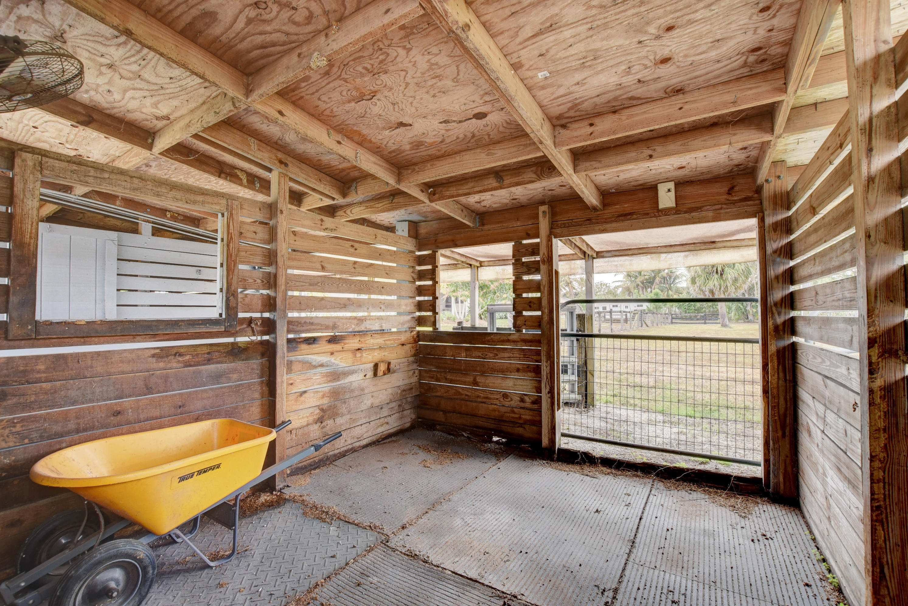16493 Rustic Road Wellington, FL 33470 - Photo 49 of 57 a view of a room with furniture