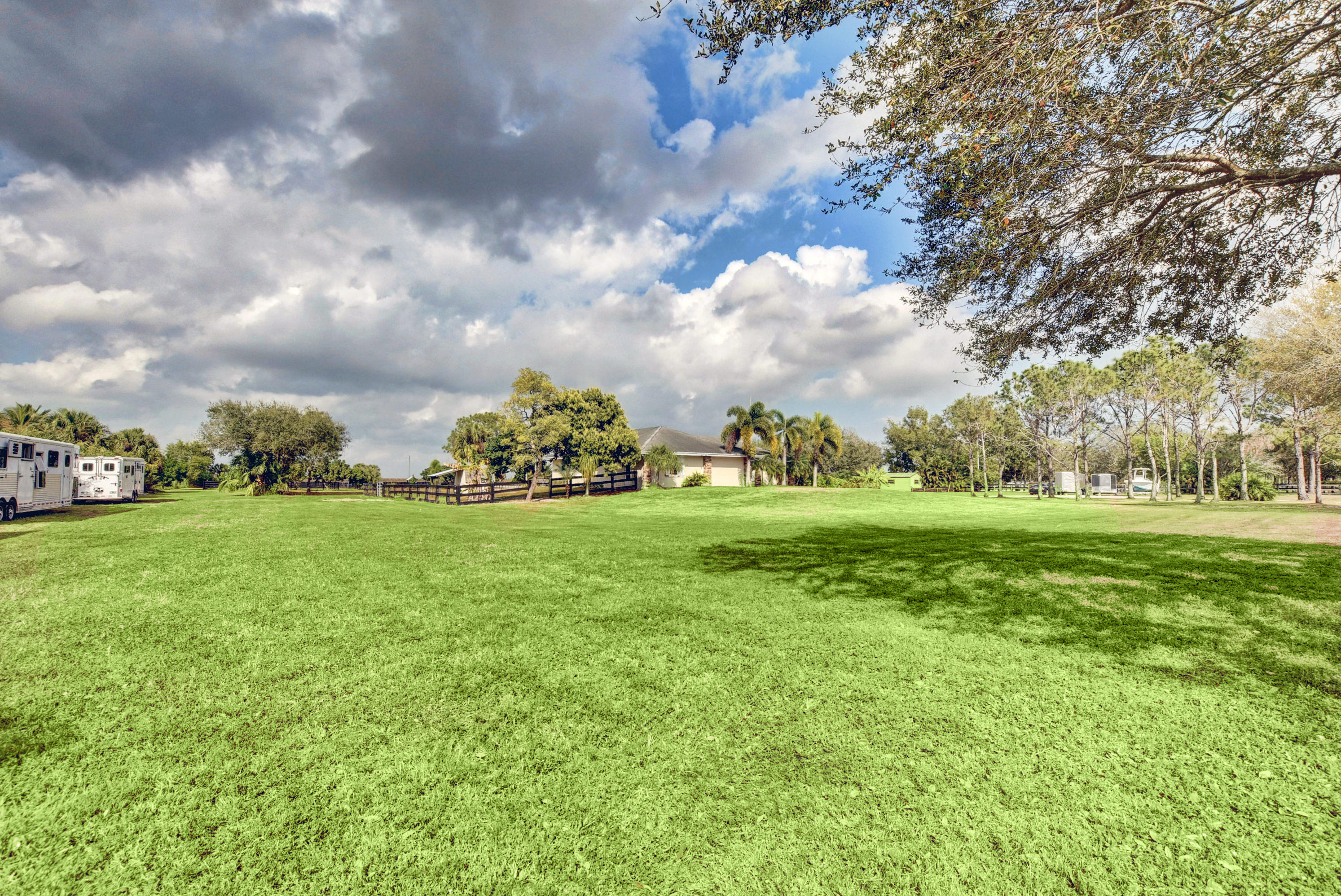 16493 Rustic Road Wellington, FL 33470 - Photo 53 of 57 a view of field with tress in the background