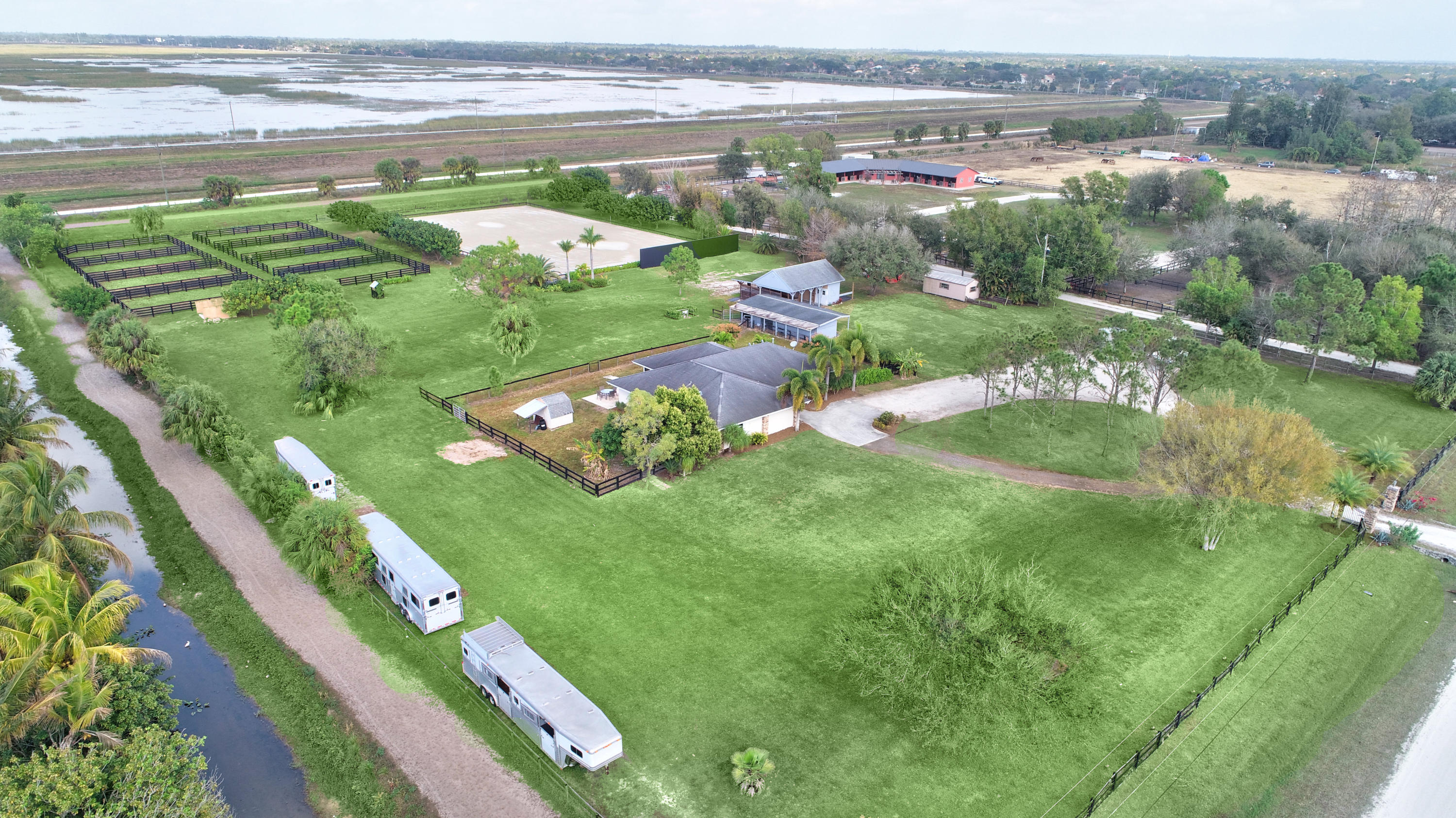 16493 Rustic Road Wellington, FL 33470 - Photo 55 of 57 a view of a city with an ocean view