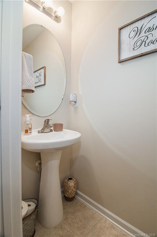 721 Jones Branch Road, Unit 75 Fort Mill, SC 29715 - Photo 29 of 36 a bathroom with a sink and mirror