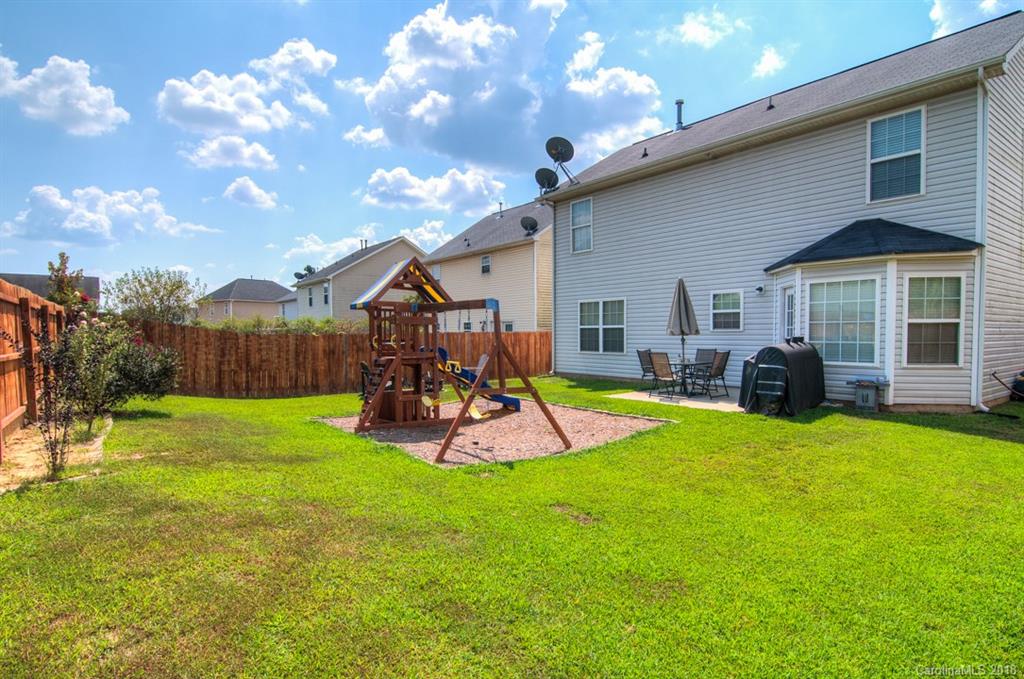 721 Jones Branch Road, Unit 75 Fort Mill, SC 29715 - Photo 35 of 36 a view of a house with backyard and porch