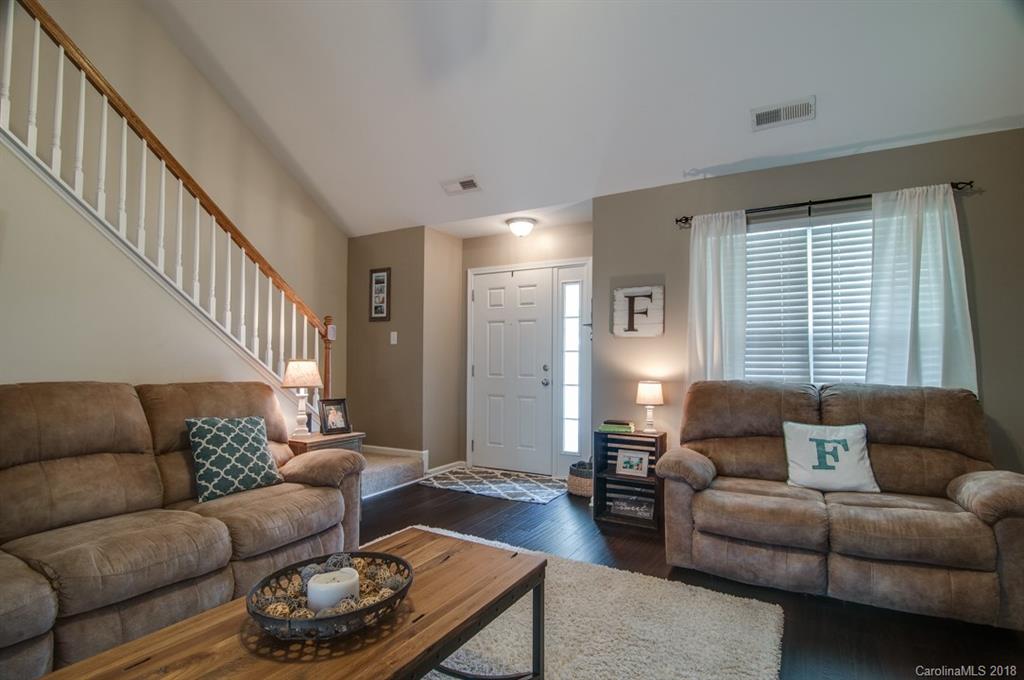 721 Jones Branch Road, Unit 75 Fort Mill, SC 29715 - Photo 9 of 36 a living room with furniture and a large window
