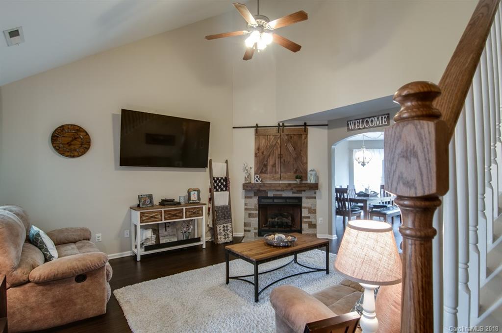721 Jones Branch Road, Unit 75 Fort Mill, SC 29715 - Photo 10 of 36 a living room with furniture and a flat screen tv