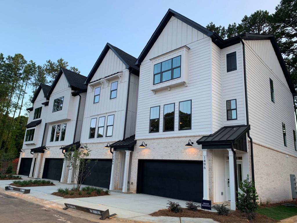 1466 Addison Place Decatur, GA 30033 - Photo 1 of 1 a front view of a house with garage