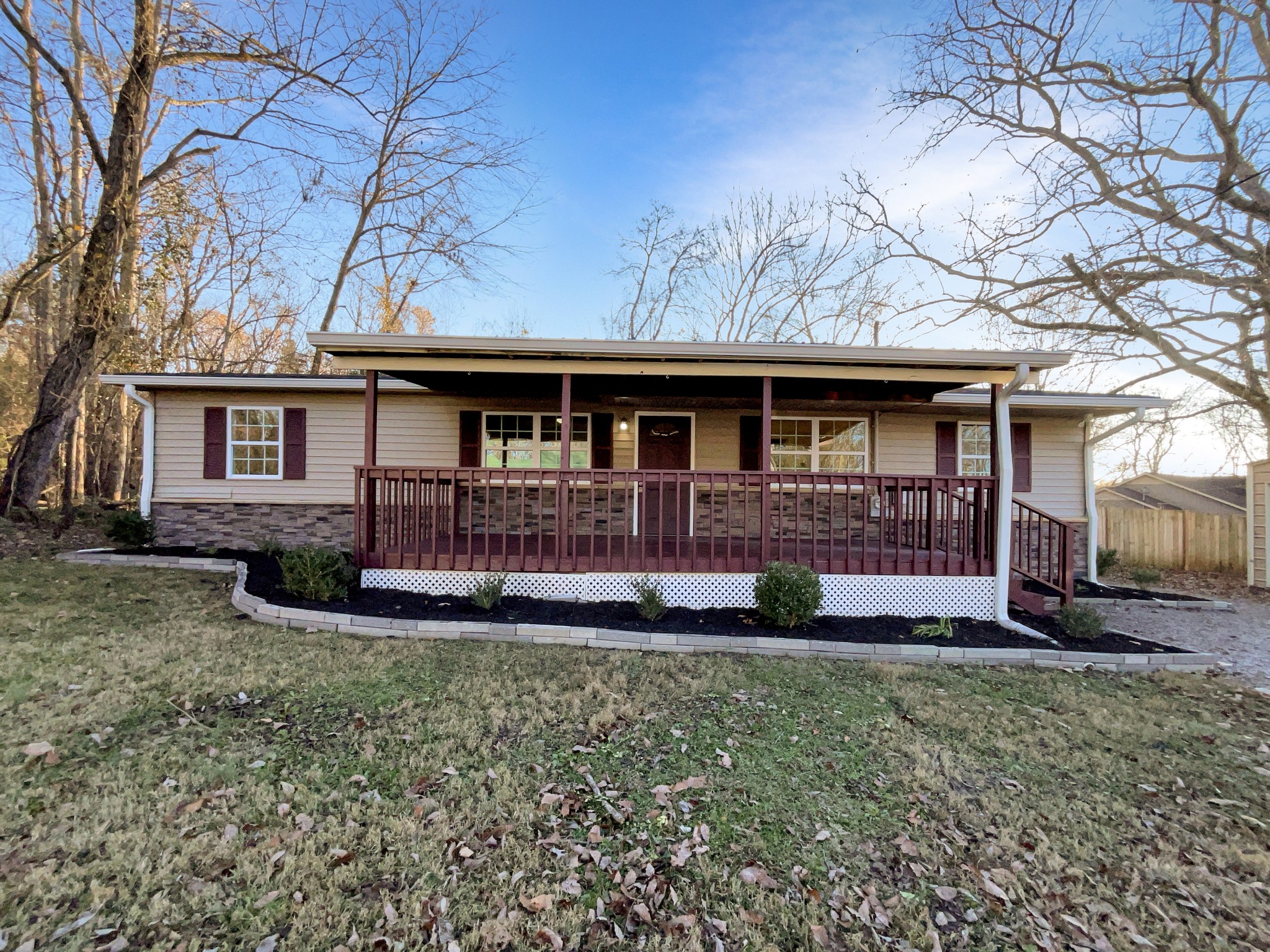 front view of a house with a yard