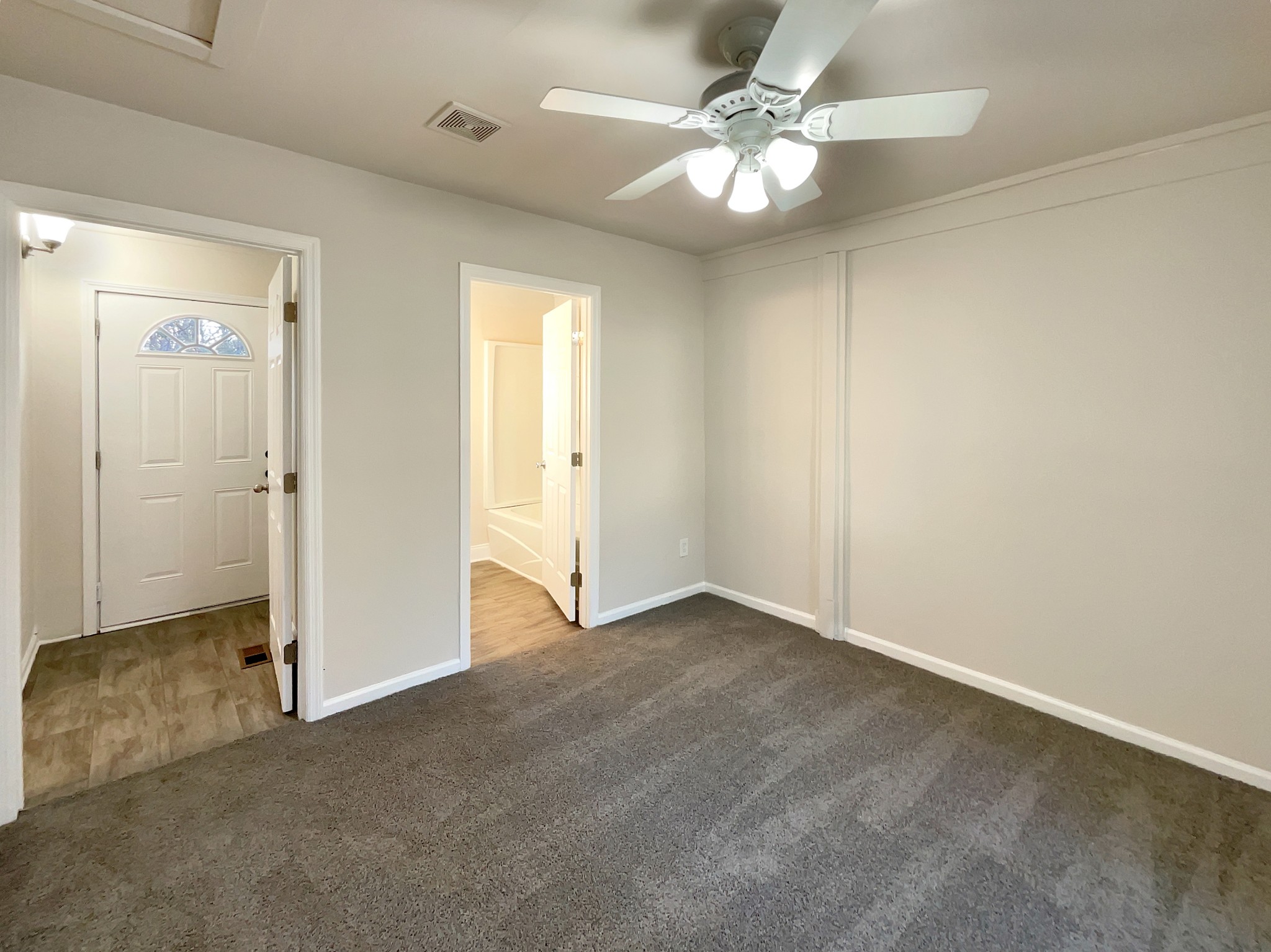 690 Thomas Road Lebanon, TN 37087 - Photo 12 of 17 a view of an empty room with a ceiling fan