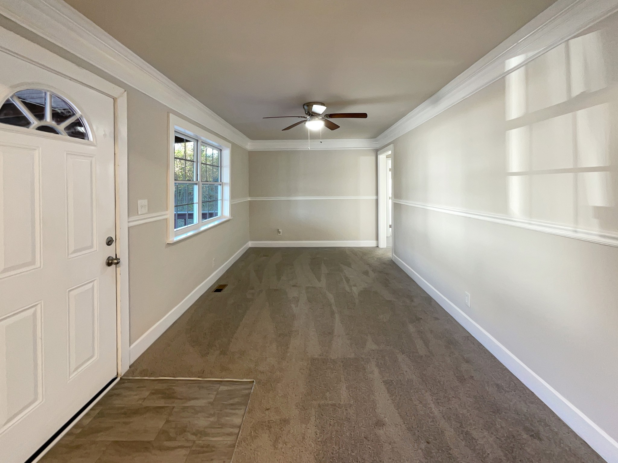 690 Thomas Road Lebanon, TN 37087 - Photo 5 of 17 wooden floor in an empty room with a window