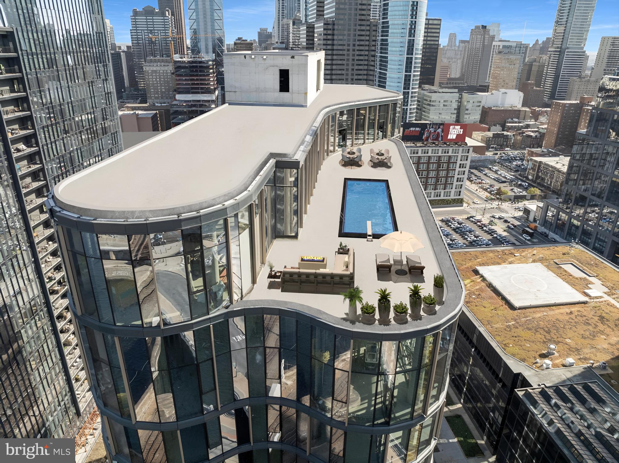 2301-61 John F Kennedy Boulevard, Unit 408 Philadelphia, PA 19103 - Photo 10 of 39 a picture of table and chairs in the patio