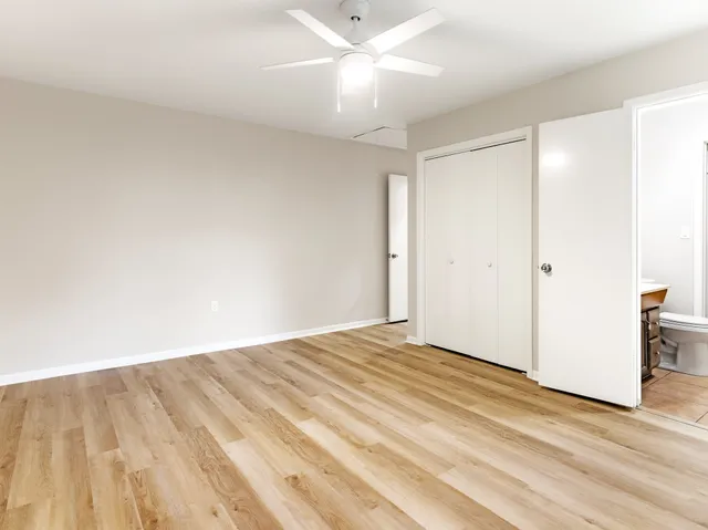 a bathroom with a toilet a sink and bathtub