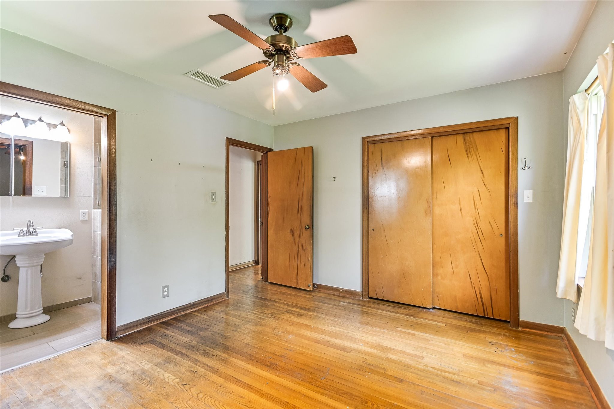502 Sunset Circle Austin, TX 78704 - Photo 13 of 27 hardwood floors including closet, ensuite bathroom