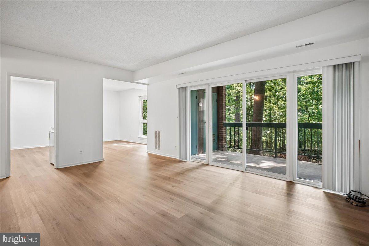 11805 Breton Court, Unit 1A Reston, VA 20191 - Photo 4 of 22 Looking out to patio