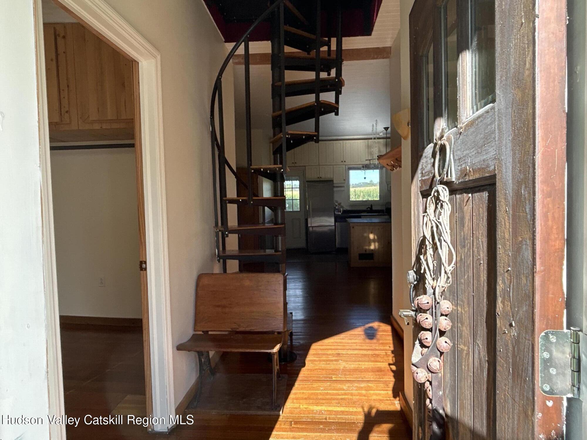 135 Rudd Pond Road Millerton, NY 12546 - Photo 2 of 10 a view of staircase with a couch