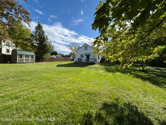 a view of a house with a big yard