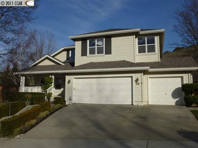 114 Windover Drive Danville, CA 94506 - Photo 1 of 1 a front view of a house with a yard and garage