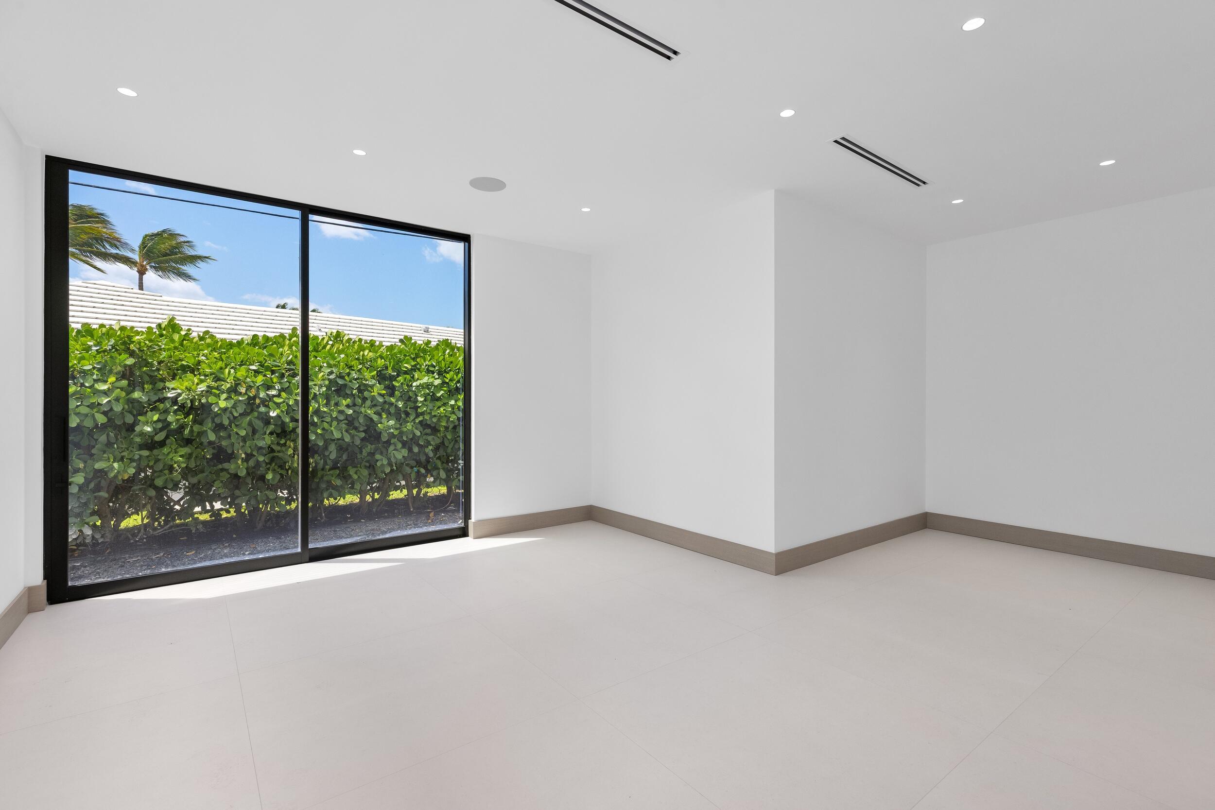 1351 Cocoanut Road Boca Raton, FL 33432 - Photo 93 of 101 a view of an empty room with a large window