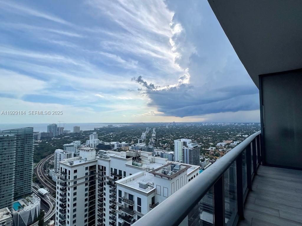 55 Southwest 9th Street, Unit 4205 Miami, FL 33130 - Photo 22 of 37 a view of a balcony with city view