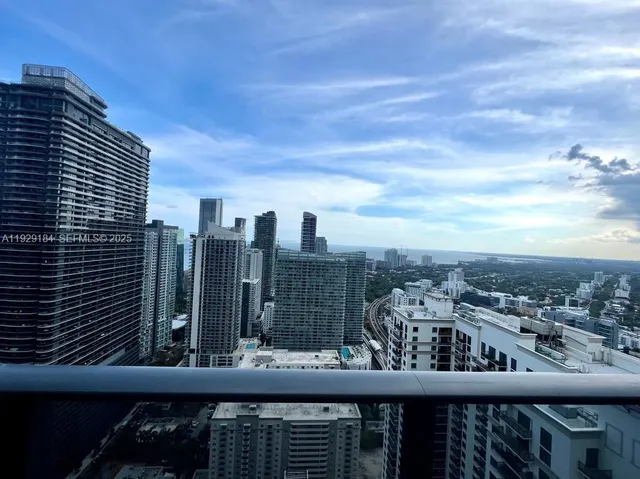 a view of a city view from a balcony
