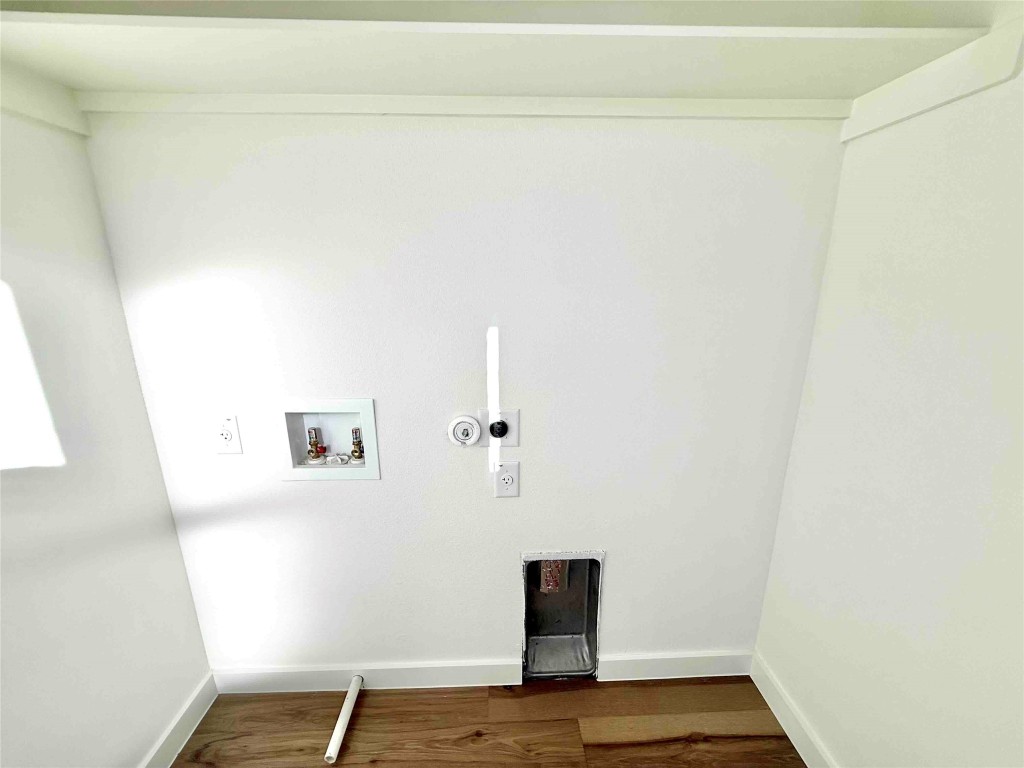 6809 Porter Street, Unit 2 Austin, TX 78741 - Photo 9 of 12 a view of a livingroom with wooden floor