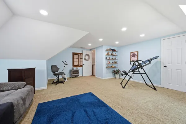 a view of a livingroom with a patio and a couch