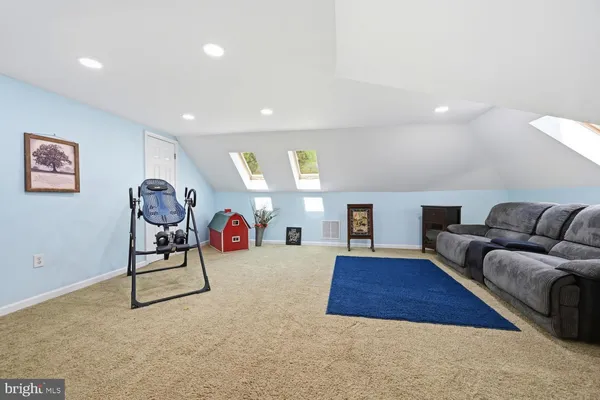 a living room with furniture and a couch