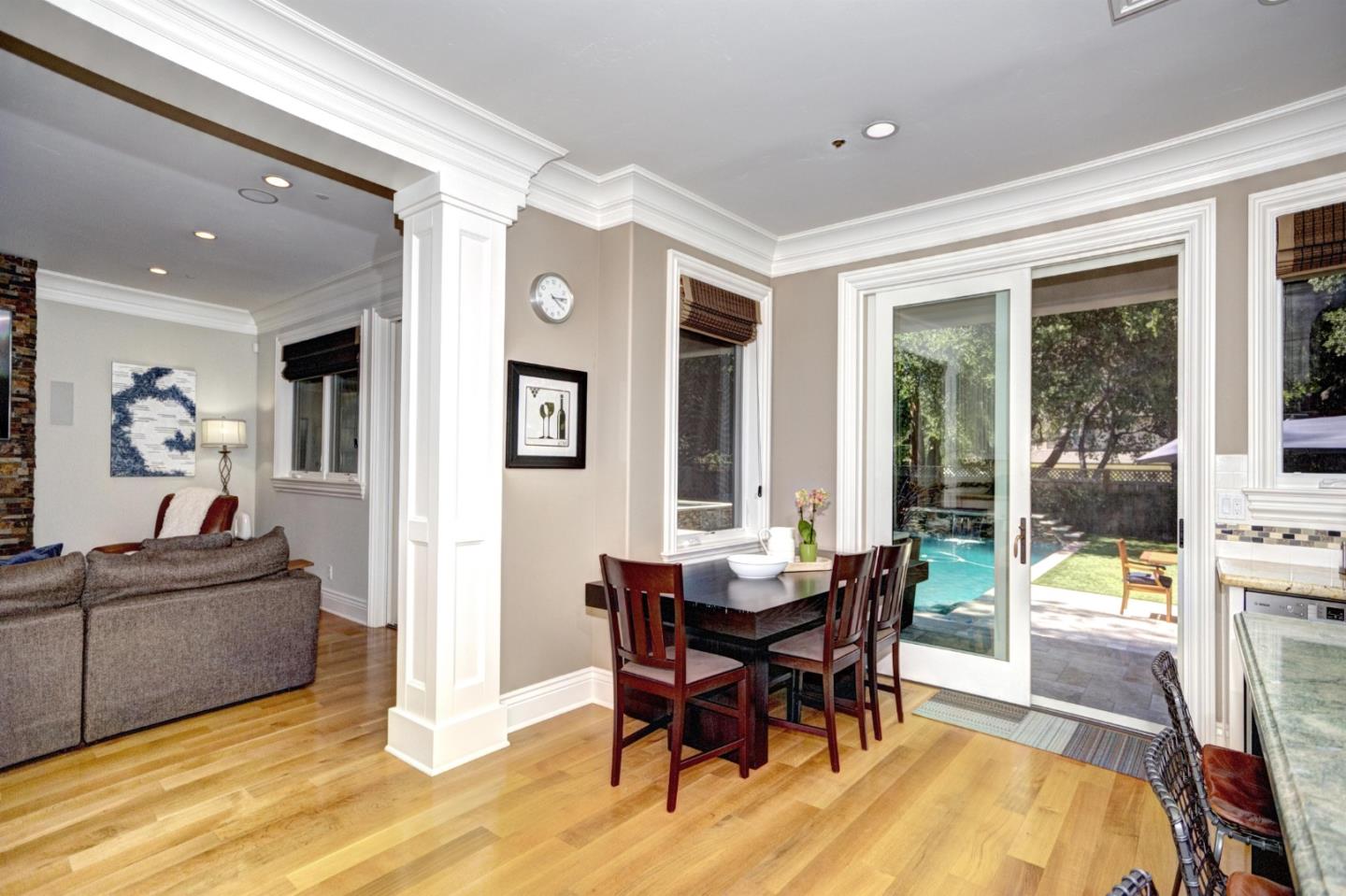 641 Mills Avenue Los Altos, CA 94022 - Photo 12 of 36 a view of a dining room with furniture and a potted plant