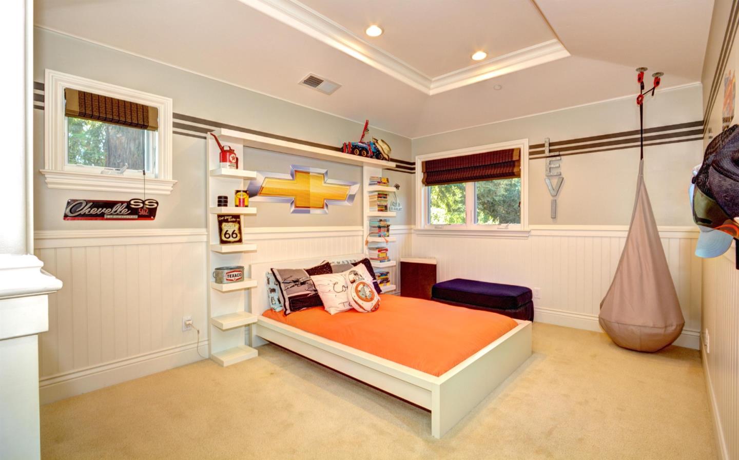 641 Mills Avenue Los Altos, CA 94022 - Photo 17 of 36 a bedroom with furniture and a window