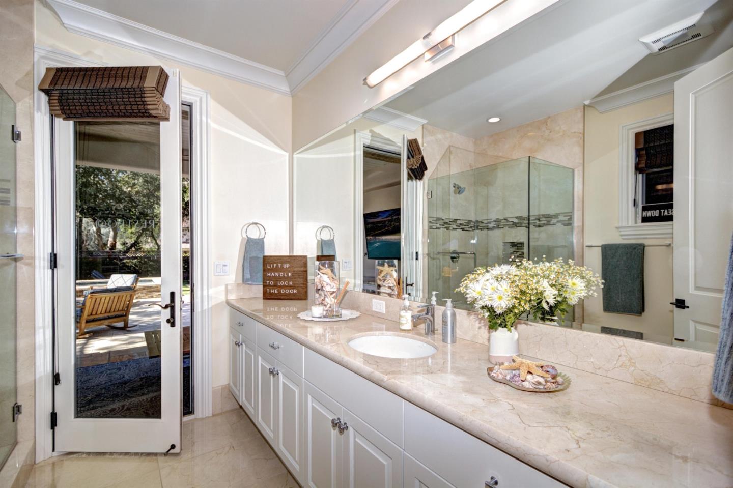 641 Mills Avenue Los Altos, CA 94022 - Photo 24 of 36 a bathroom with sink and mirror
