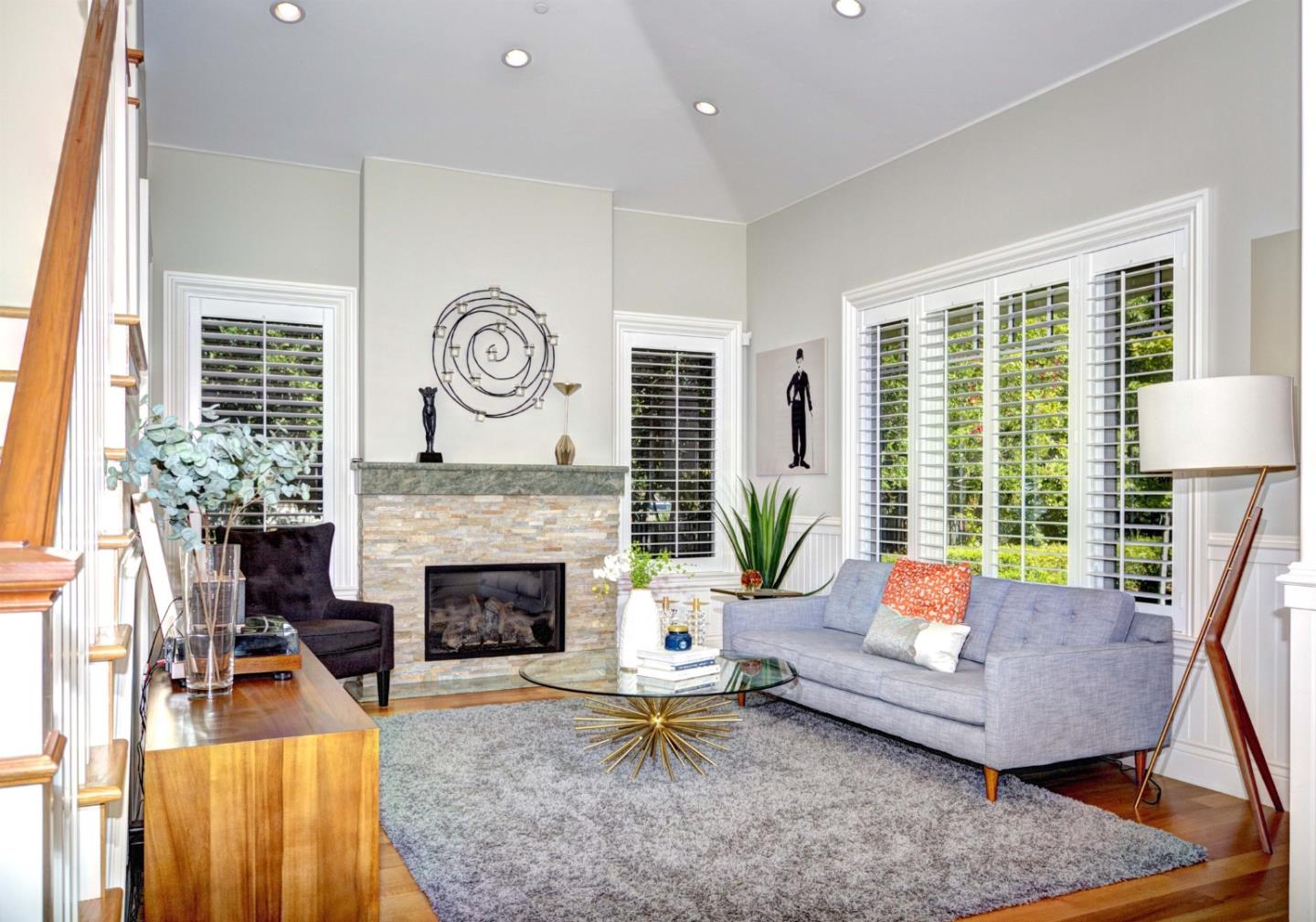 641 Mills Avenue Los Altos, CA 94022 - Photo 5 of 36 a living room with furniture a large window and a fireplace