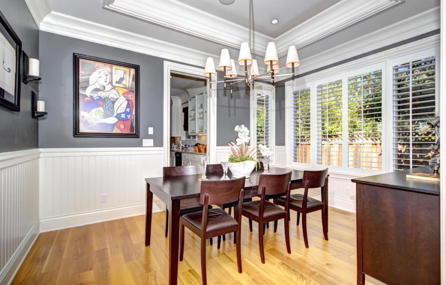 641 Mills Avenue Los Altos, CA 94022 - Photo 9 of 36 a view of a dining room with furniture large window and wooden floor
