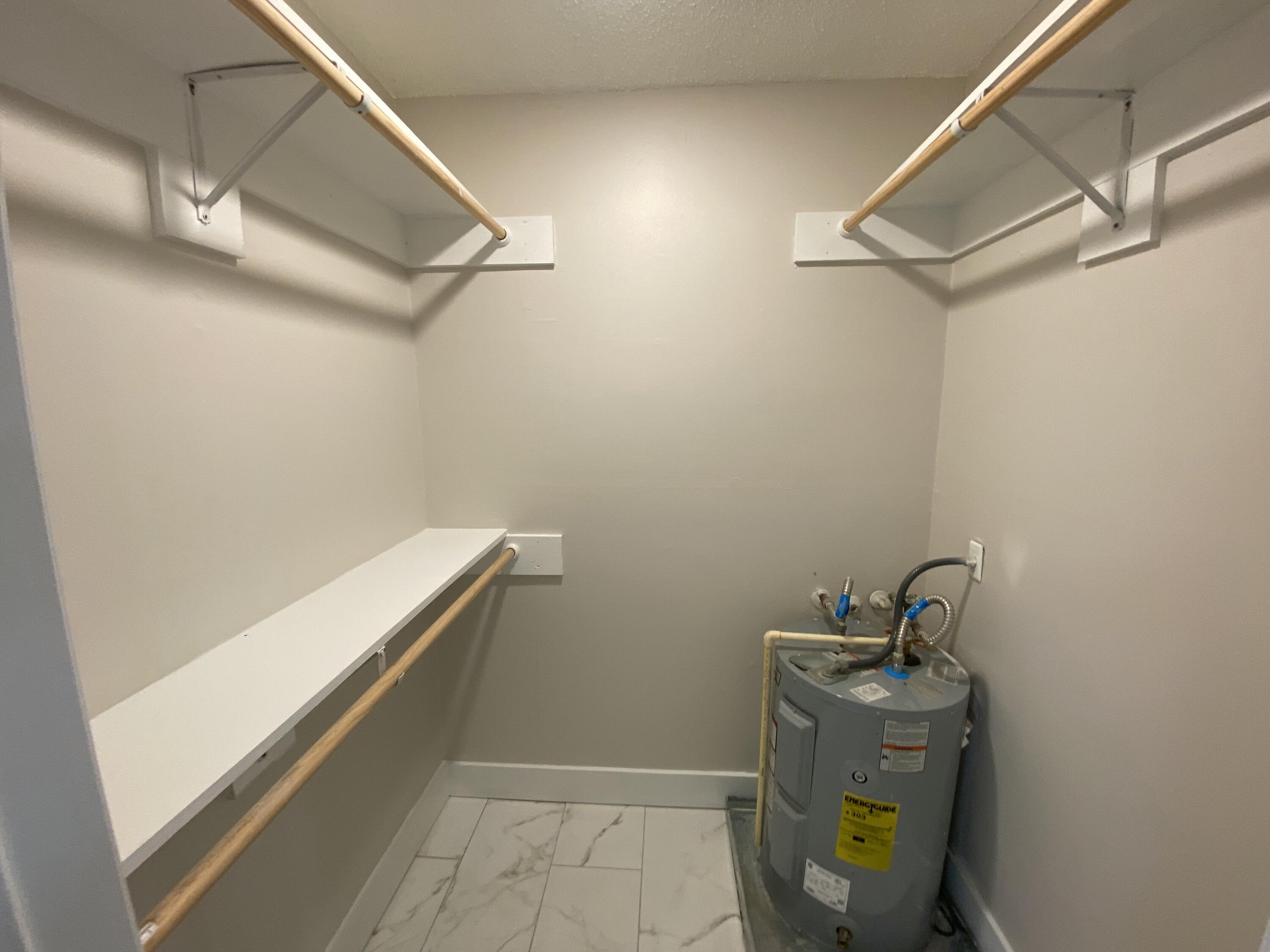 914 North Federal Highway, Unit 2 Lake Worth Beach, FL 33460 - Photo 9 of 13 a view of storage and utility room with racks on the wall